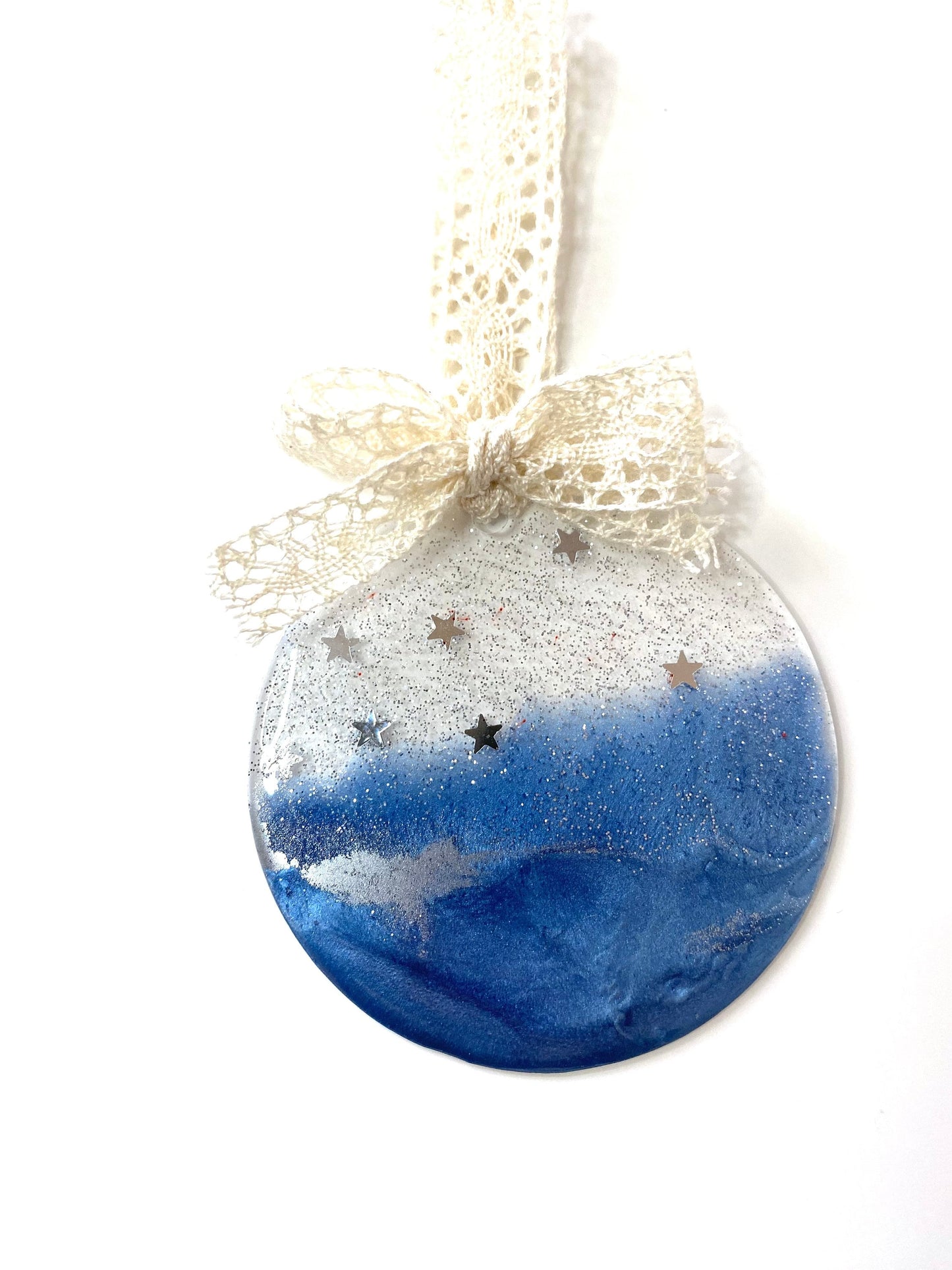 Blue Baby First Christmas resin bauble with glittery silver top and twinkling stars, non-personalised, hanging with beige lace ribbon and bow