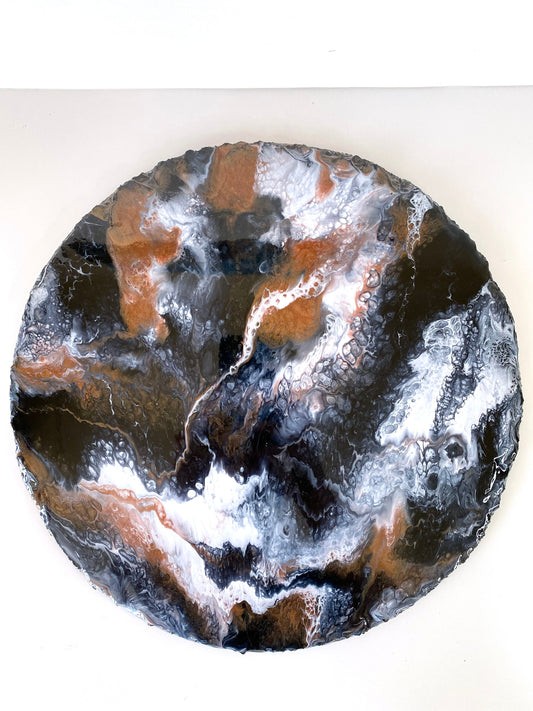 Top-down view of handmade black and bronze resin tray with slate base, large round coffee table and vanity tray, plain display showing elegant decorative design for home or serving.