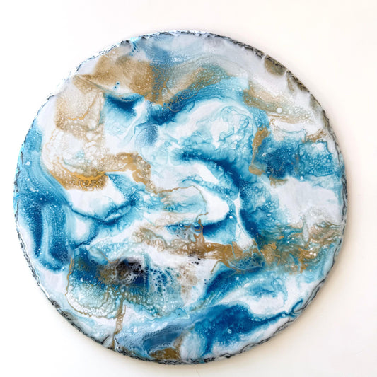 Top-down view of handmade ocean resin tray with slate base, showing blue and white resin wave design, coastal-inspired home decor tray for serving or display.