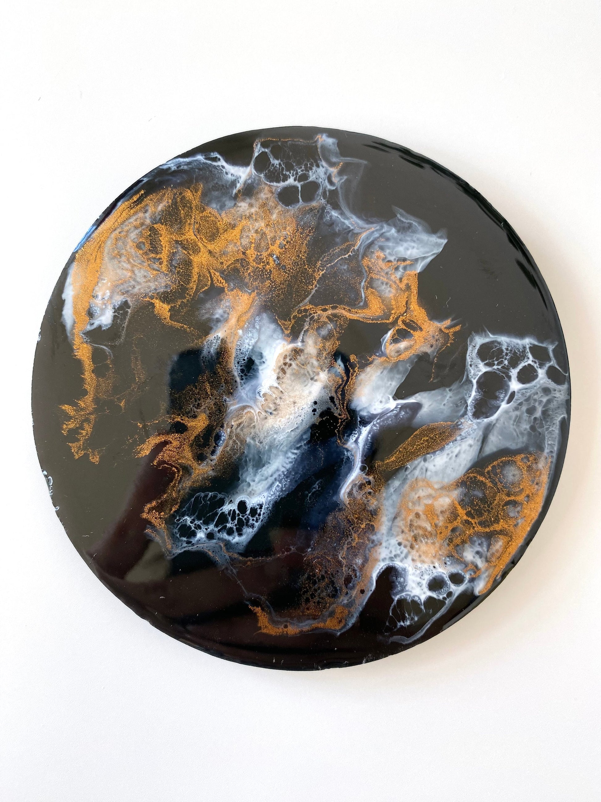 Single round resin and slate coaster in black, white and bronze, handmade abstract design, each coaster unique and one-of-a-kind, decorative coaster for home or gifts.