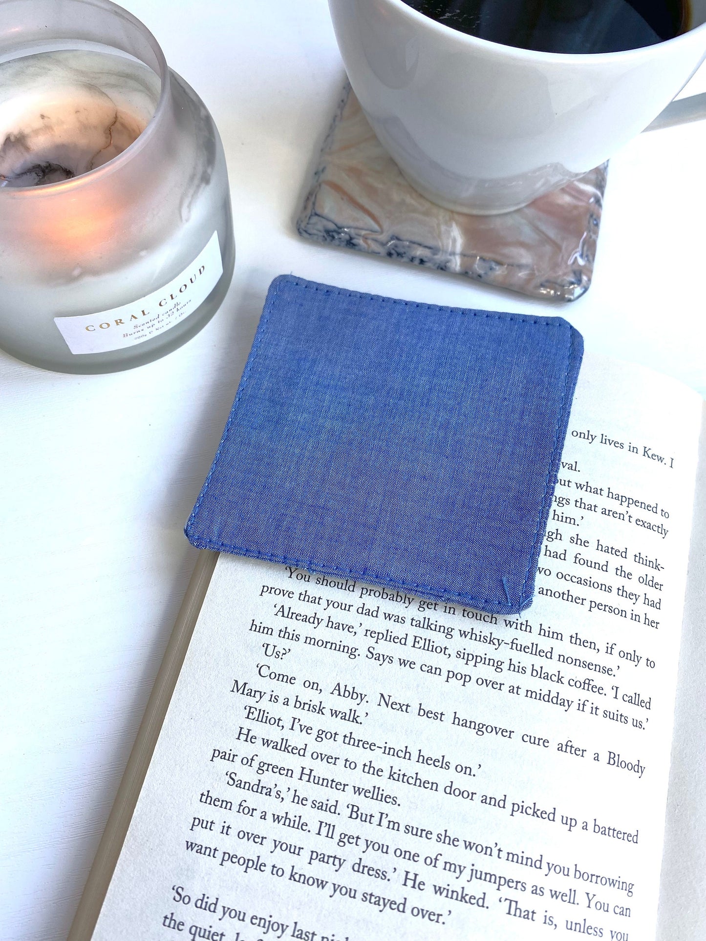 Back view of handmade fabric corner bookmark showing blue denim-style cotton fabric, square shape – lightweight and durable bookmark for book lovers.