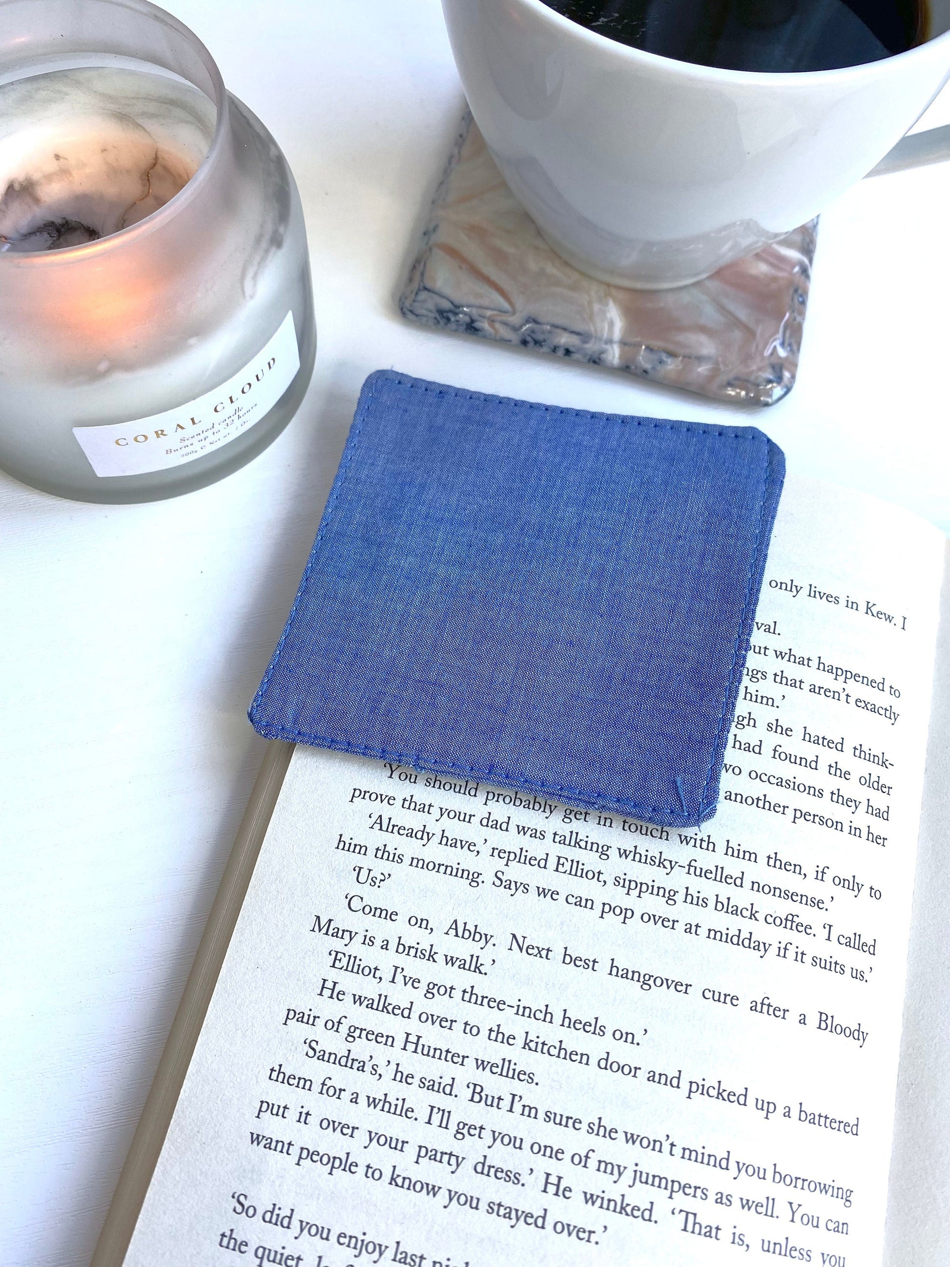 Back view of handmade fabric corner bookmark showing blue denim-style cotton fabric, square shape – lightweight and durable bookmark for book lovers.