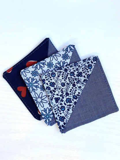 Three handmade fabric corner bookmarks in Heart Print, Tiny Flowers Print, and Daisy Print designs, displayed together – perfect gifts for book lovers and teachers.