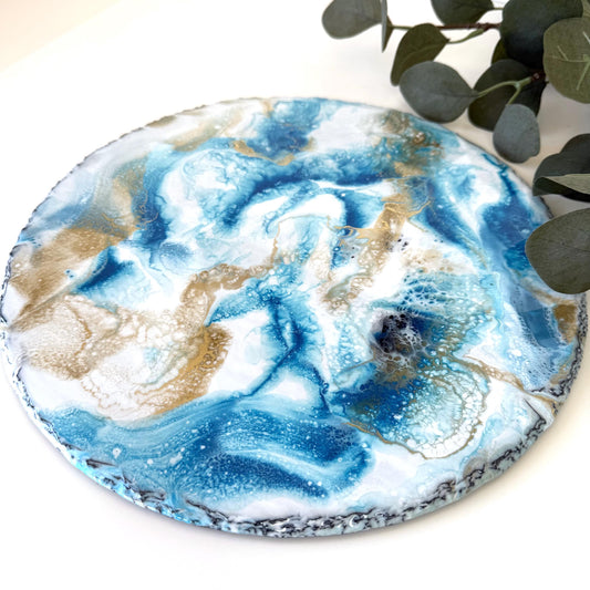 Handmade ocean resin tray with slate base, coastal-inspired home decor tray, empty display showing blue and white resin waves, elegant decorative tray for serving or display.