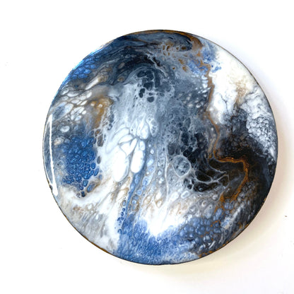 Handmade round slate resin coaster with unique blue, white, black, and gold epoxy design – each coaster is one-of-a-kind and cannot be replicated.